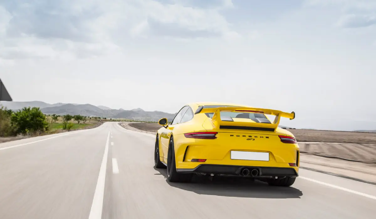 Porsche - 911 GT3 Touring - Coupe Car Rentals - Preowned Coupe Car - Exclusive Concierge Club.webp